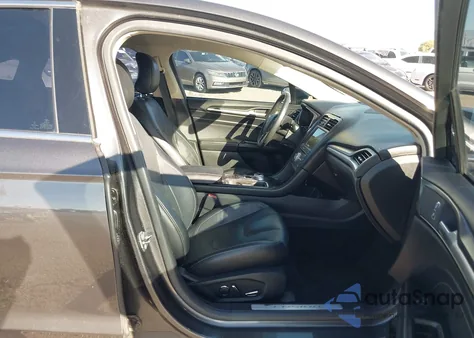 2017 Ford Fusion Energi Titanium from USA, damaged, VIN 3FA6P0SU0HR379525